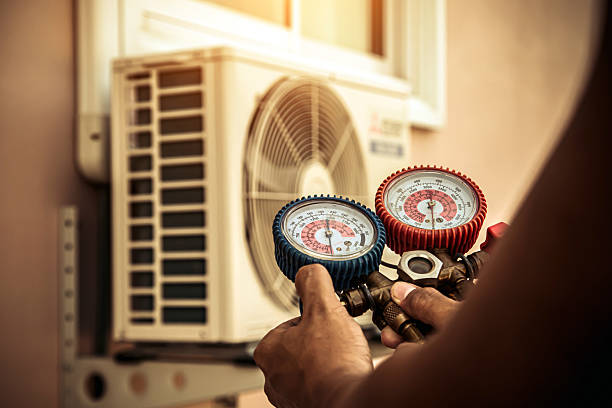 Professional Hvac technician working in Wales, WI